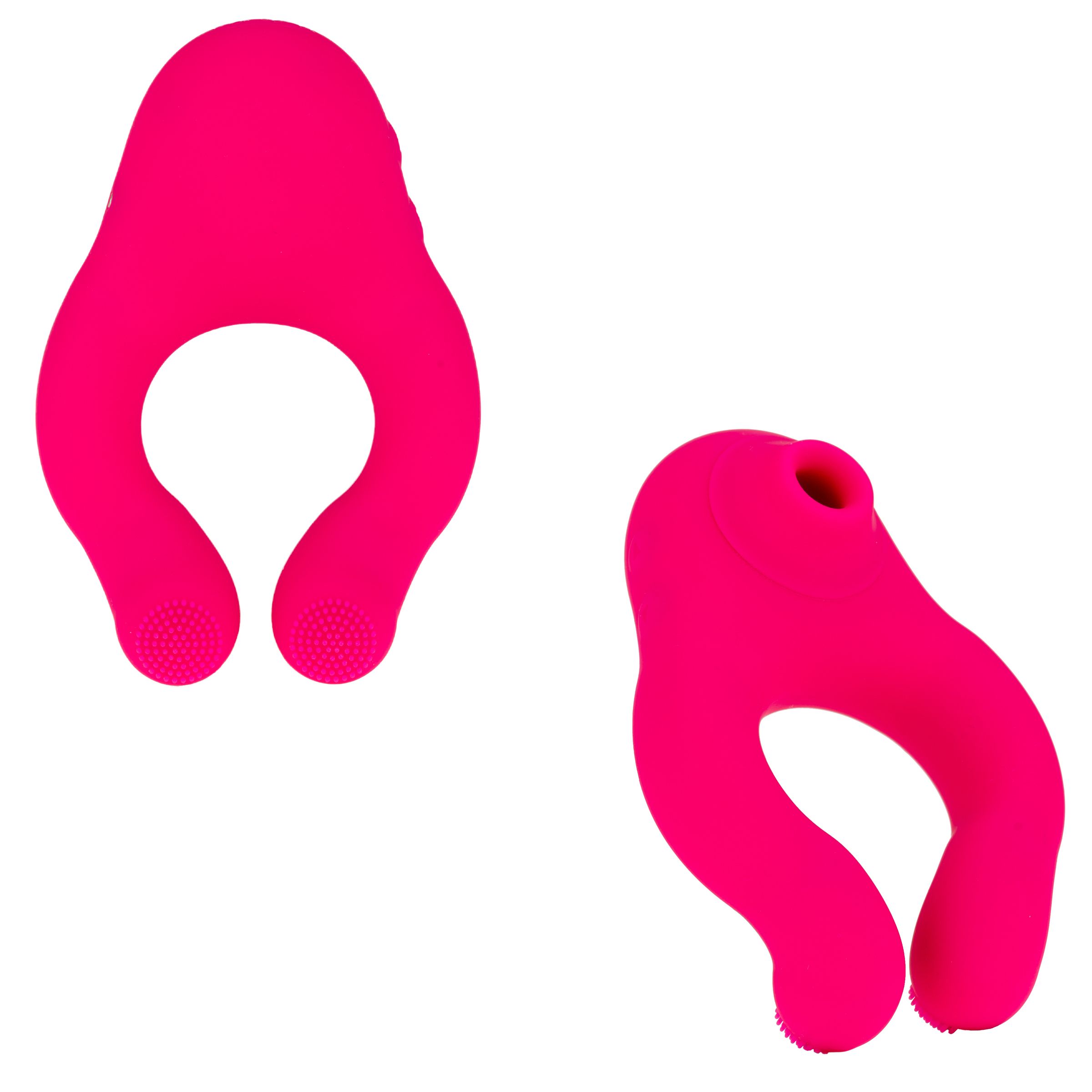 Due giocattoli sessuali rosa a forma di U. Con apertura e punti in rilievo. Un foro in alto.