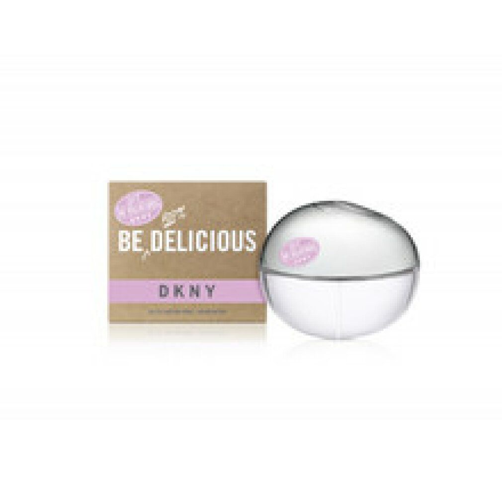 Flacone rotondo accanto a confezione marrone. Adesivo rosa con testo: Be Delicious DKNY. Confezione con testo.