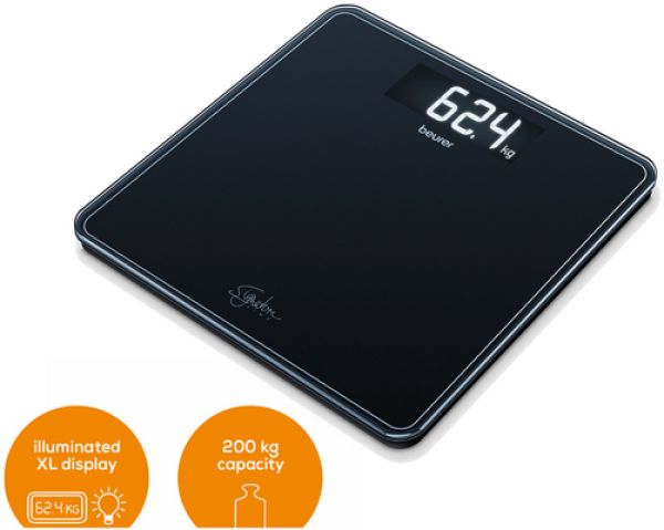 Bilancia nera con display digitale. Mostra 62,4 kg. Marchio: beurer. Logo Signature Line. Cerchi informativi.