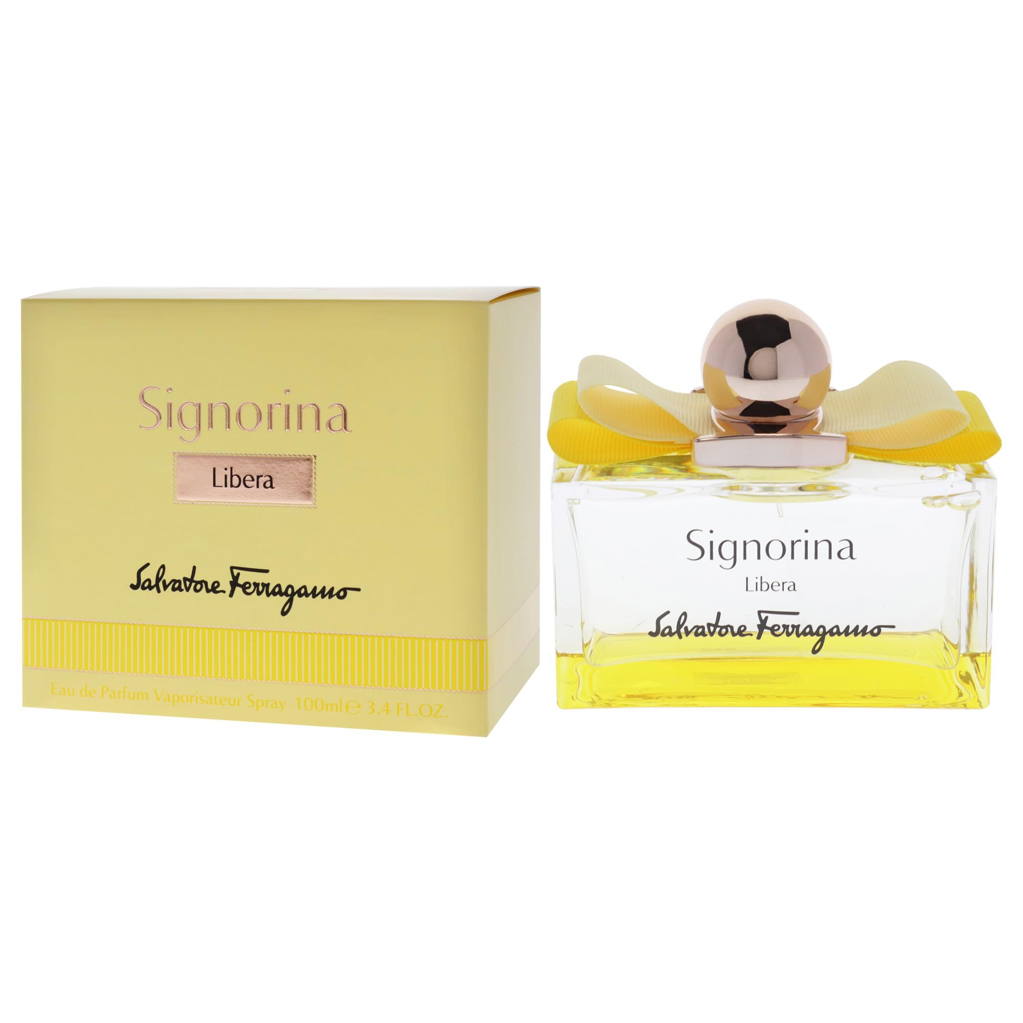 Flacone di profumo e scatola. Flacone con liquido giallo, tappo dorato e fiori. Scatola con scritta Signorina Libera.