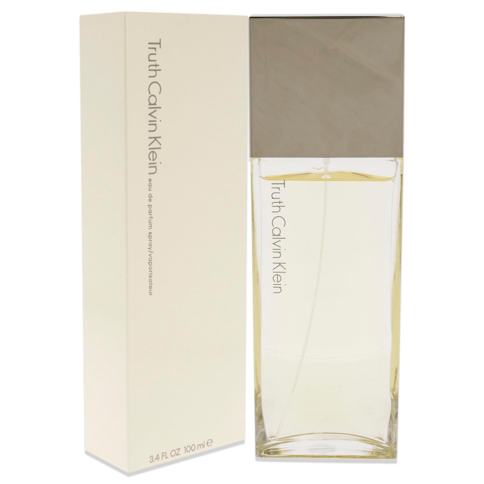 Flacone di profumo e confezione. Flacone rettangolare, tappo argentato. Confezione beige, scritta.