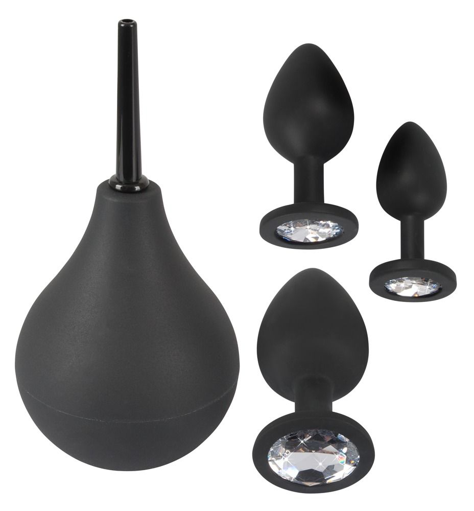 Set di tre plug anali neri con accenti di cristallo e un irrigatore nero. Tutti in silicone.