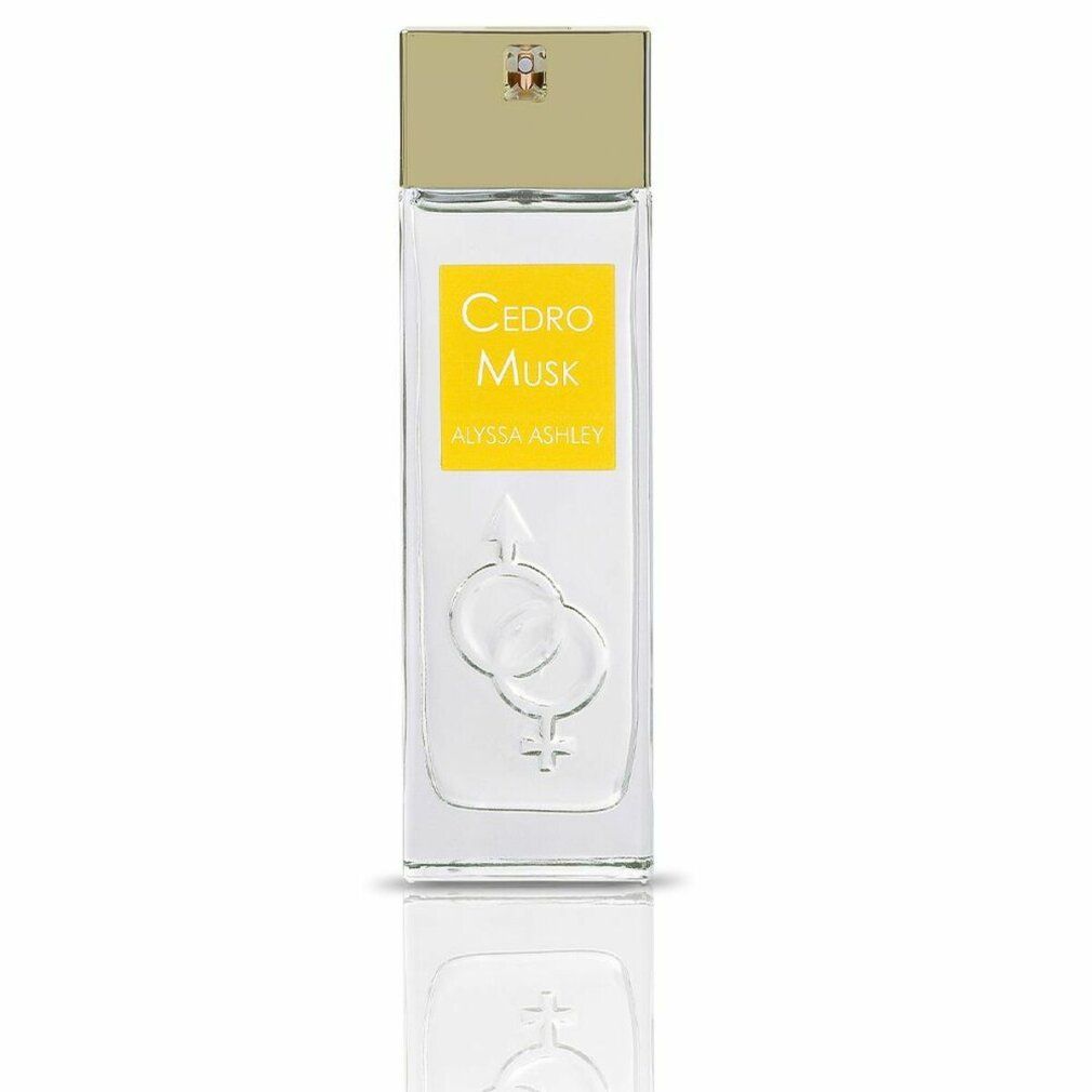Flacone rettangolare con tappo dorato. Etichetta gialla con "Cedro Musk" e "Alyssa Ashley".