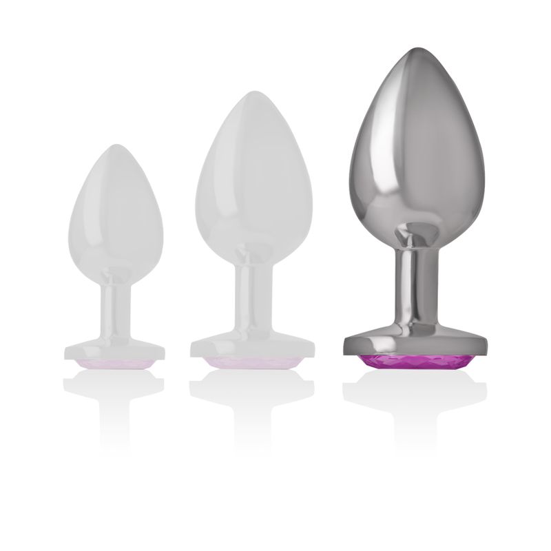 Plug anale in metallo con cristallo rosa, vista frontale.