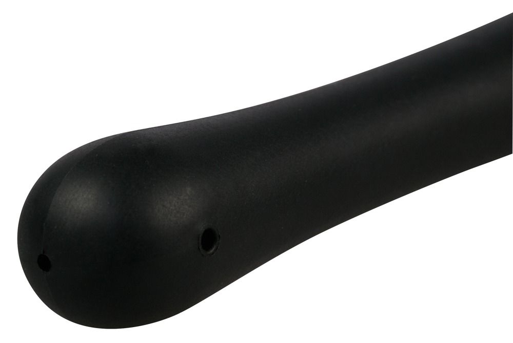 Primo piano dell'ugello sottile nero di una doccia anale. Due aperture sulla punta.