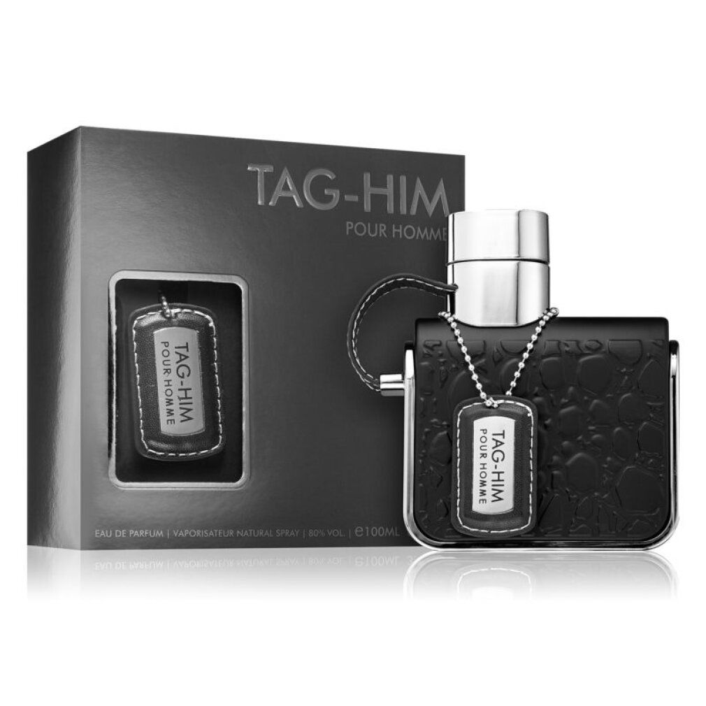 Scatola nera e flacone. Sulla scatola è scritto "TAG-HIM POUR HOMME". Il flacone ha un ciondolo.