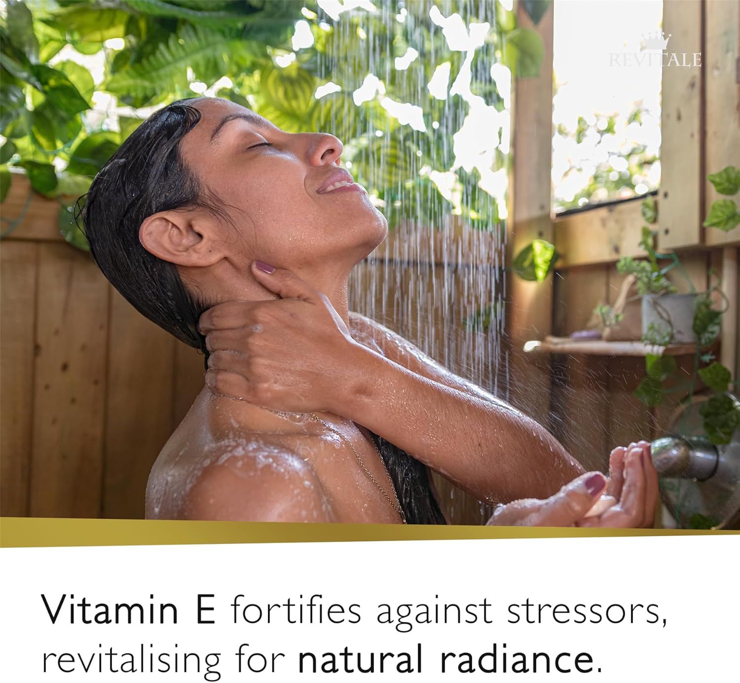 Donna sotto la doccia. Logo Revitale in alto a destra. Testo: La vitamina E fortifica contro i fattori di stress, rivitalizzando.
