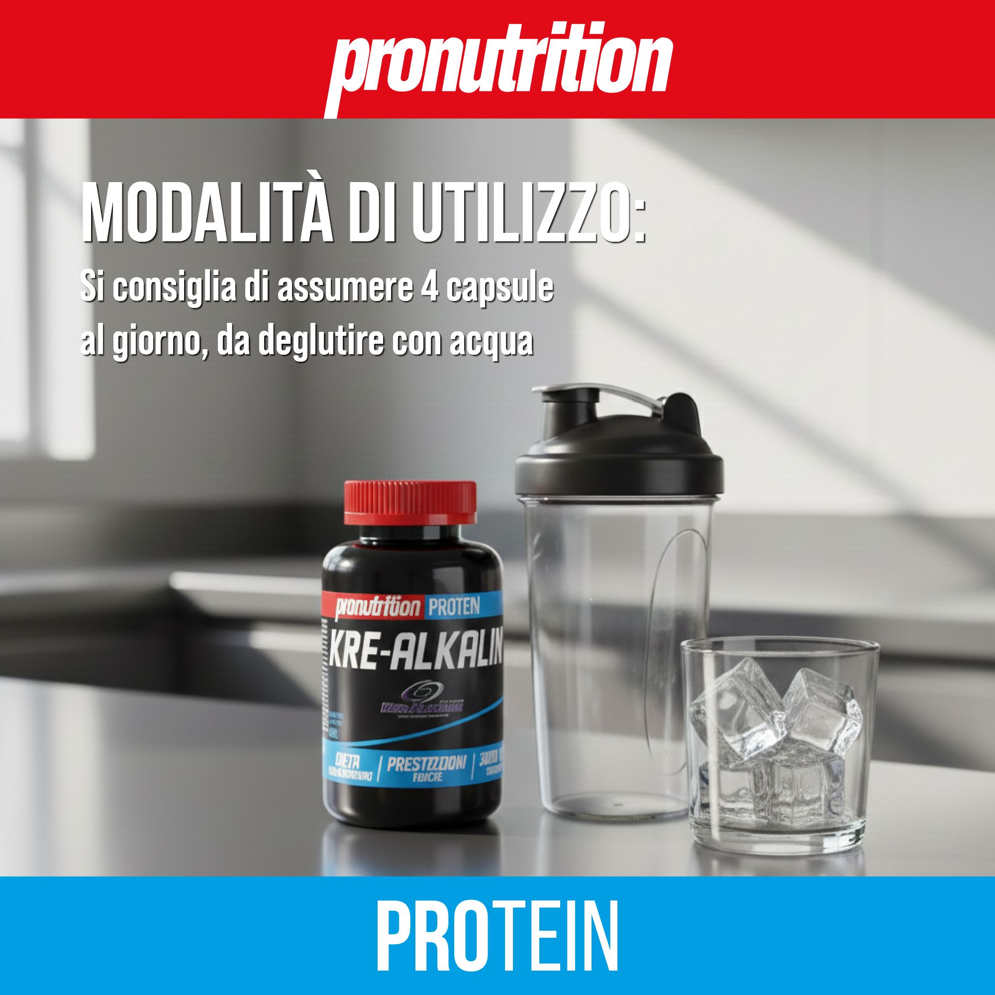 Flacone nero con tappo rosso, testo e nome del prodotto. Accanto shaker e bicchiere con ghiaccio.