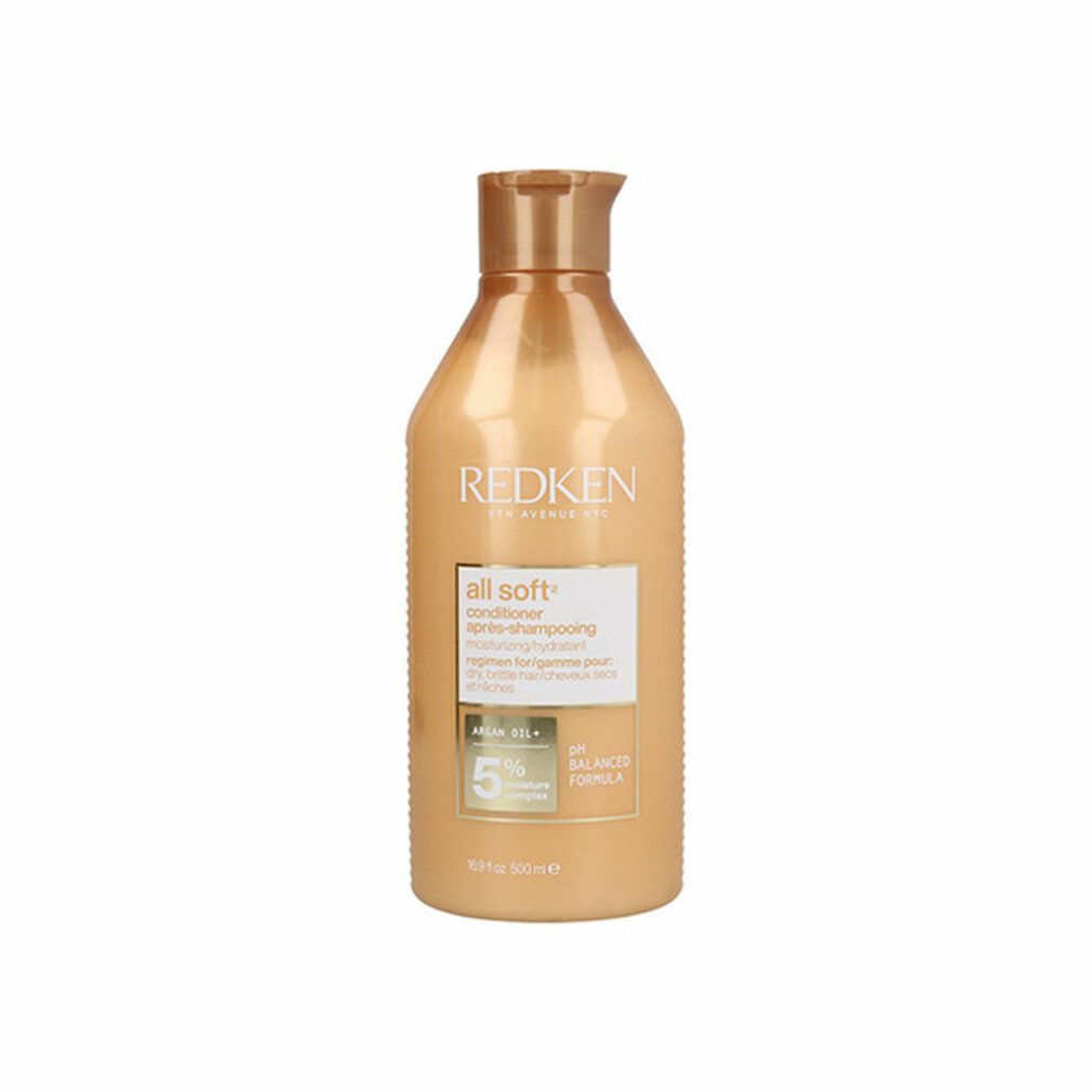 Flacone dorato di balsamo. Scritte: Redken, All Soft. Contiene olio di argan e complesso idratante al 5%. pH bilanciato.