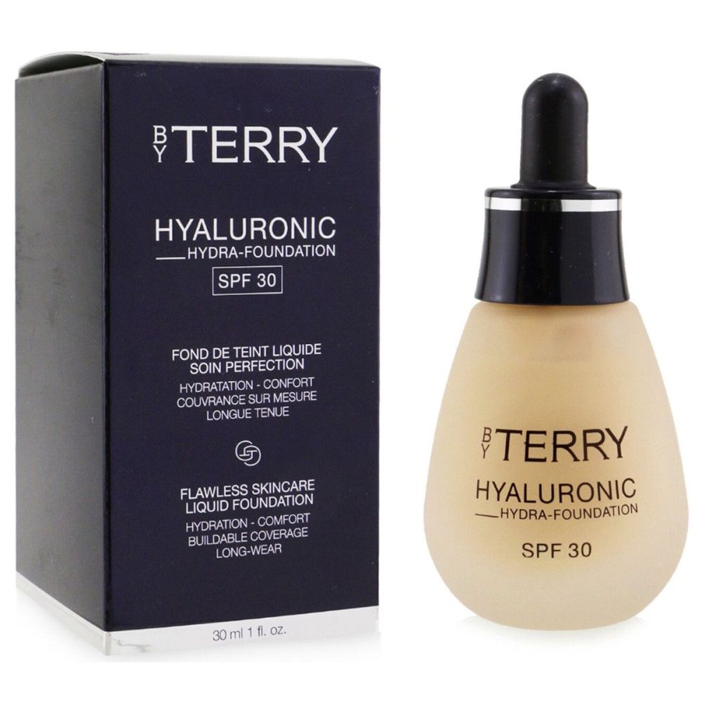 Fondotinta liquido con confezione. Scritta: BY TERRY, Hyaluronic Hydra-Foundation, SPF 30. 30 ml.