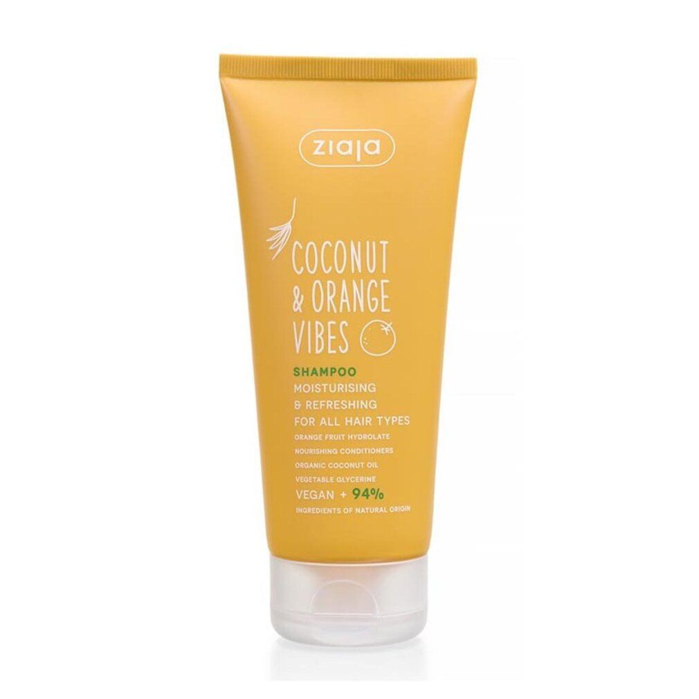 Tubo giallo di shampoo. Scritta: Coconut & Orange Vibes, Shampoo, idratante & rinfrescante. Marchio: Ziaja. Vegan + 94%.