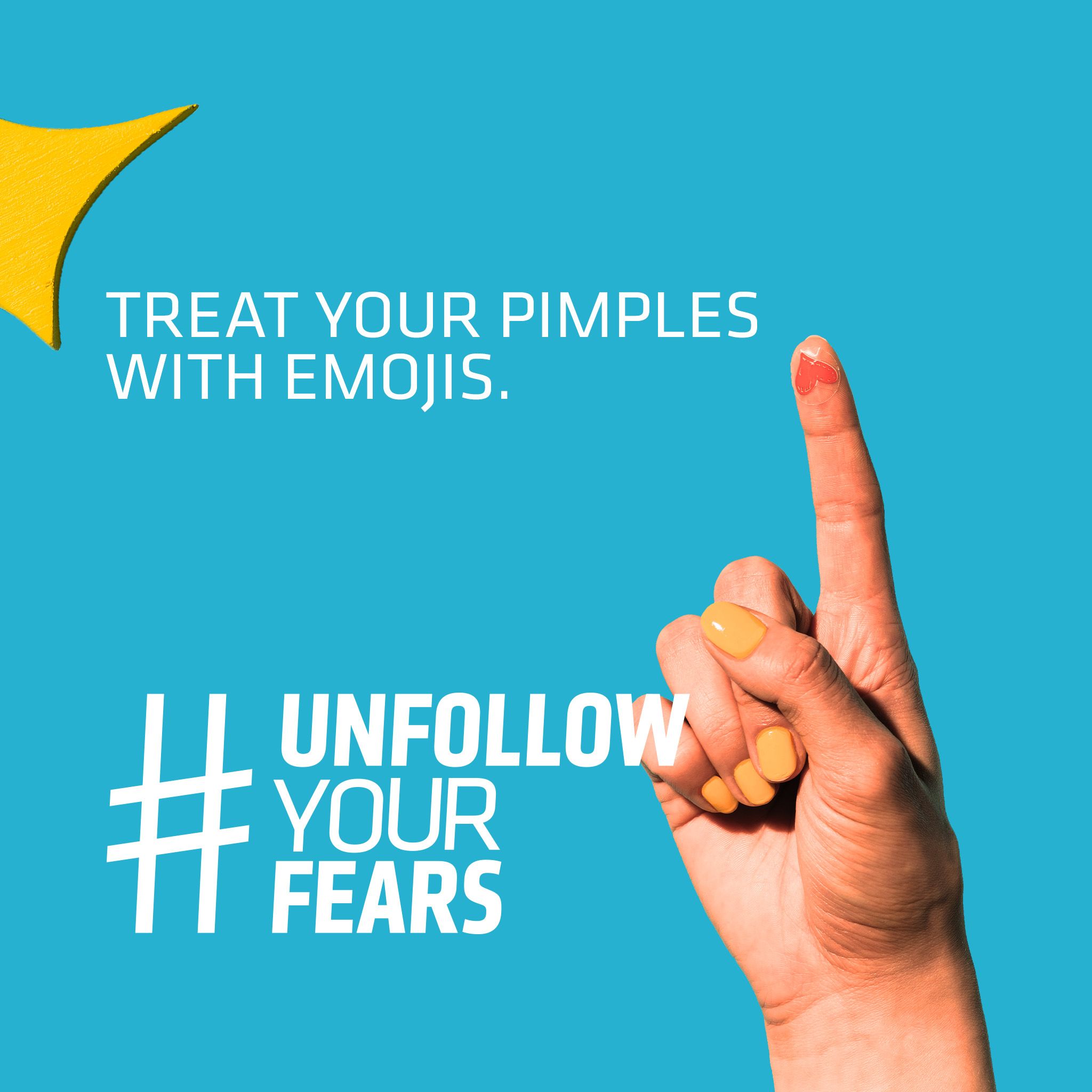 Mano con smalto giallo indica un punto rosso. Testo: Treat your pimples with emojis. #Unfollow your fears.