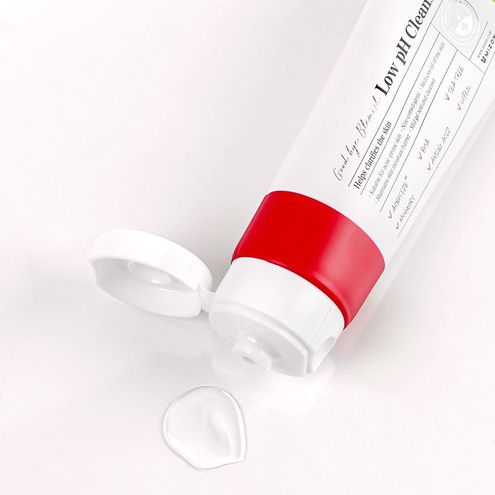 Tubo bianco e rosso. Scritta: Low pH Cleanser. Marchio: MIZON. Tubo aperto, prodotto accanto.
