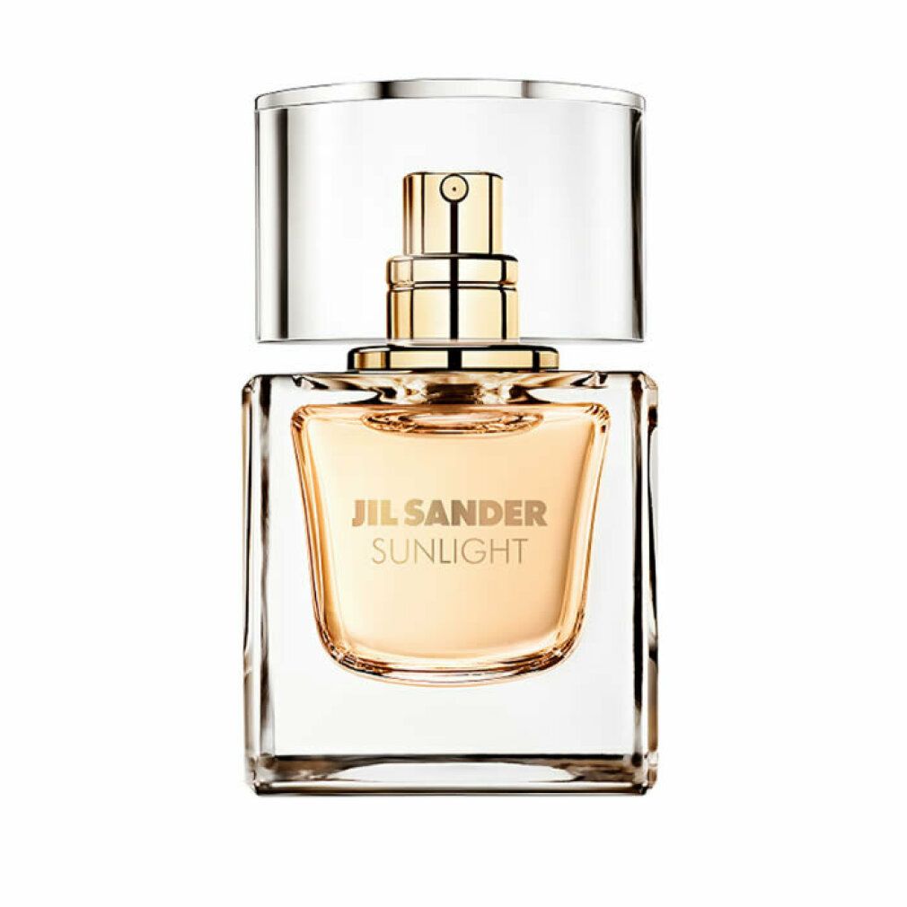 Flacone di profumo Jil Sander Sunlight. Flacone quadrato in vetro con vaporizzatore e tappo dorati. Scritta Sunlight.