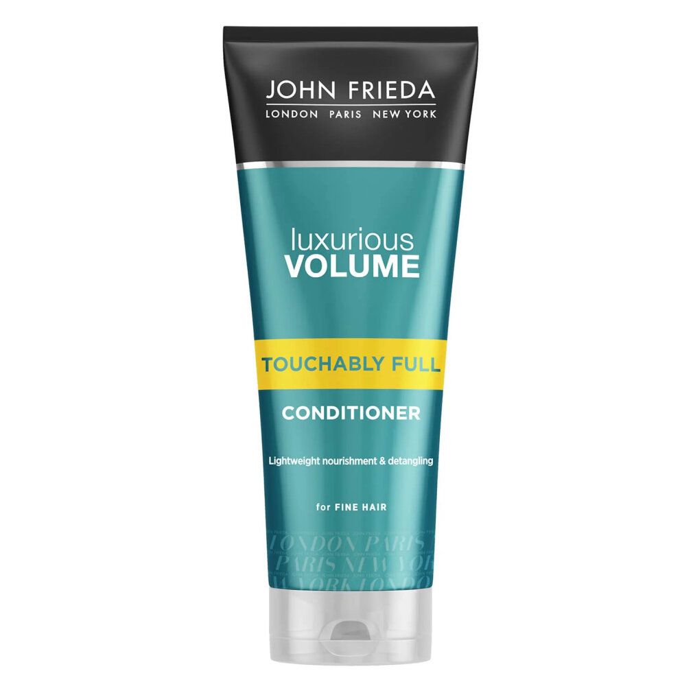 Tubo di balsamo John Frieda. Volume lussuoso, Touchably Full. Per capelli fini. Design verde e bianco, tappo nero.
