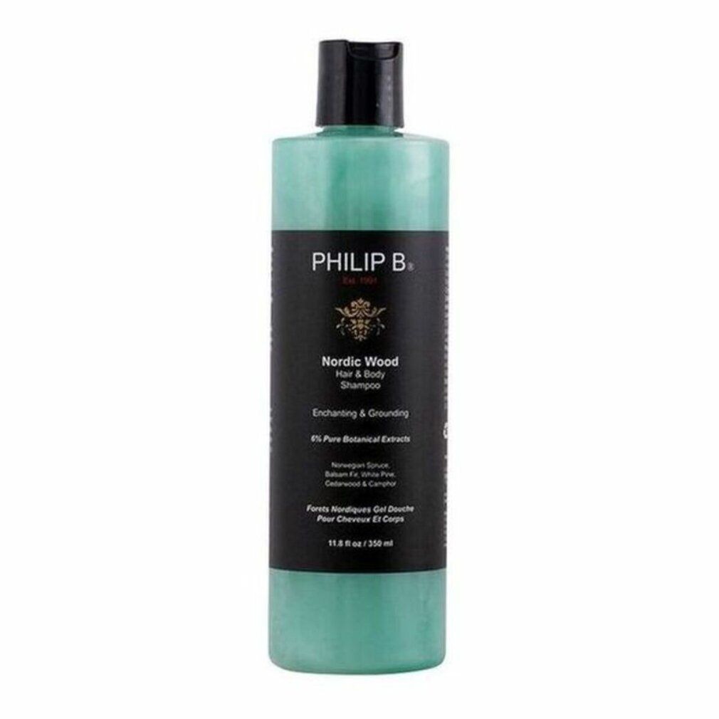 Flacone di shampoo PHILIP B Nordic Wood Hair + Body. Liquido verdognolo visibile. Testo: Enchanting & Grounding. Tappo nero. 350 ml.