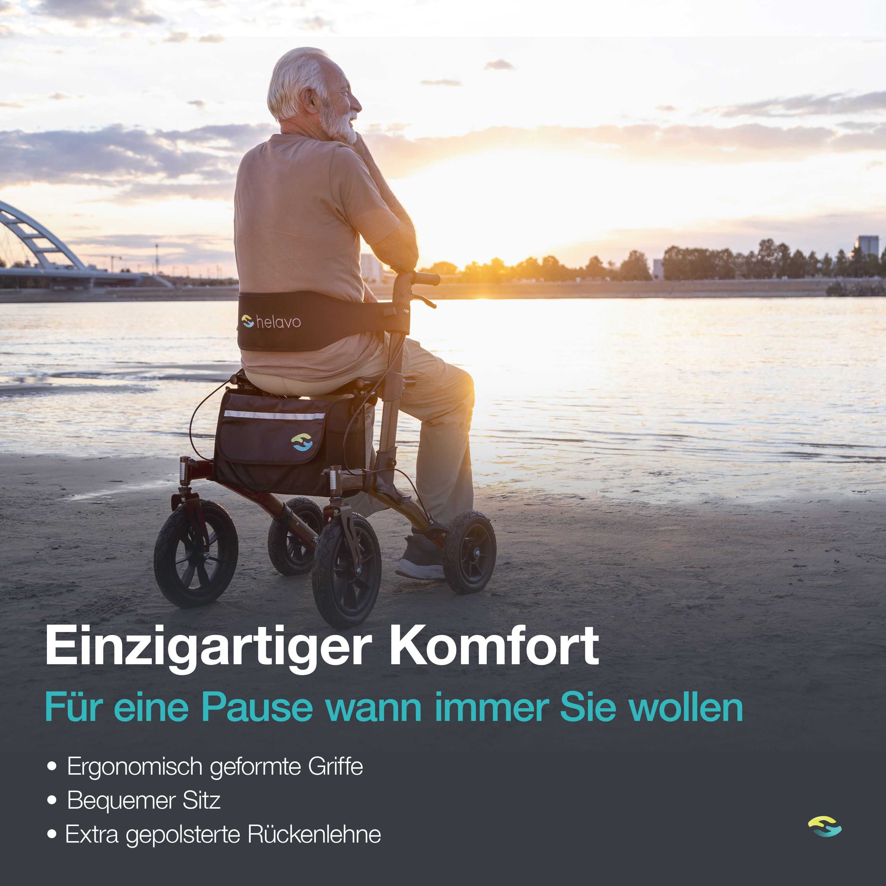 Rollator Helavo con sedile, schienale e maniglie ergonomiche sulla spiaggia.