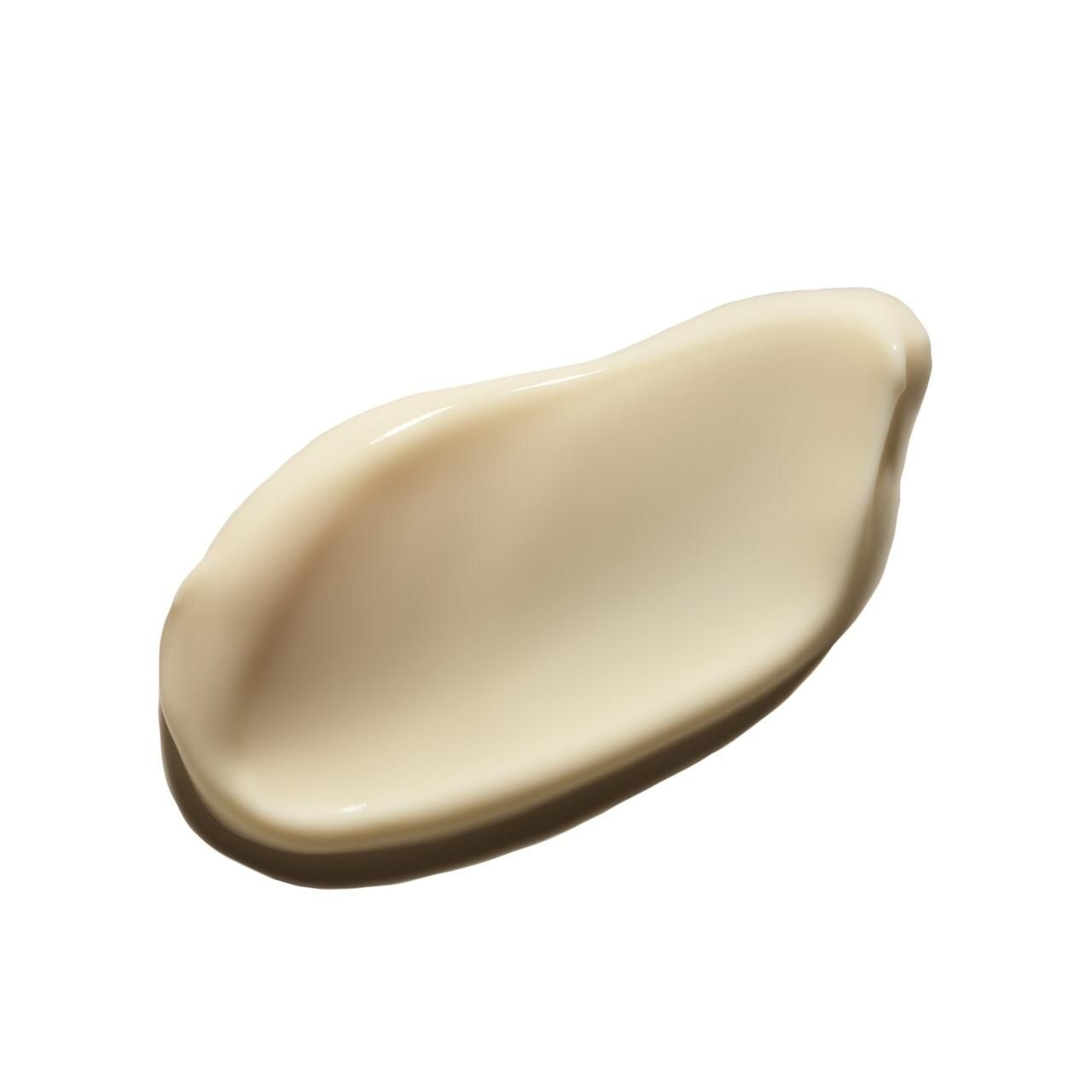 Macchia di crema su sfondo bianco. Consistenza color crema.