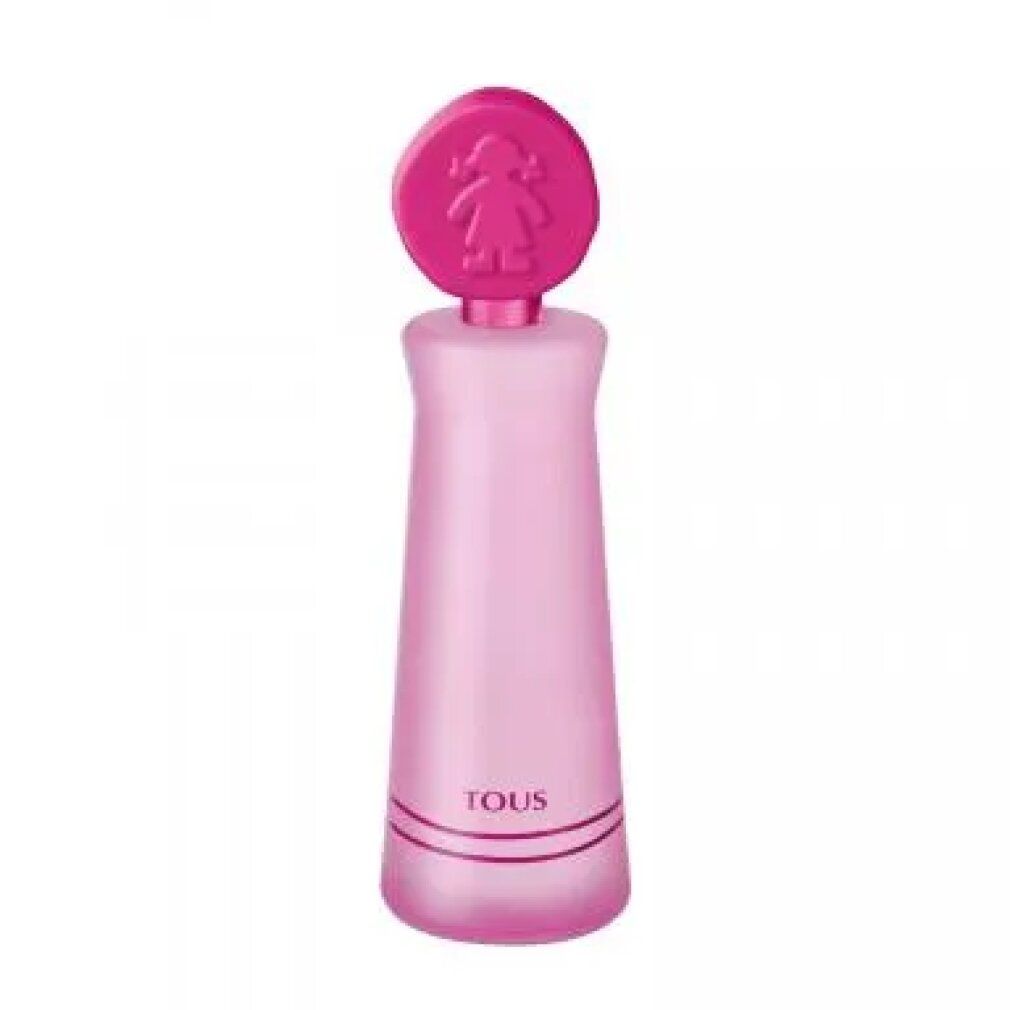 Flacone rosa con tappo rotondo, sagoma di ragazza. Scritta 'TOUS' sul flacone.