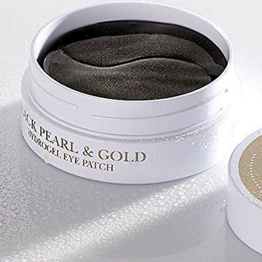 Barattolo aperto con patch occhi in idrogel neri. Scritta: Black Pearl & Gold, Hydrogel Eye Patch.