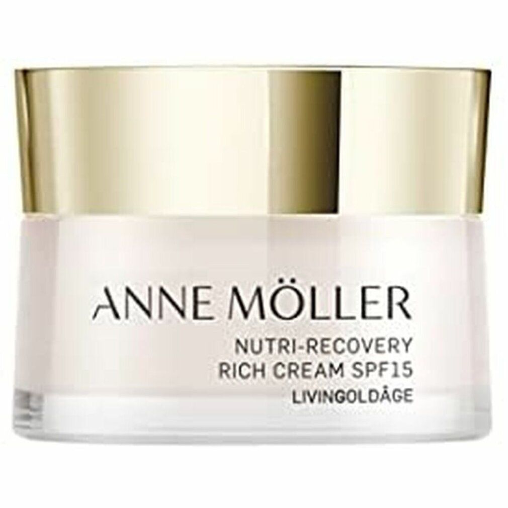 Vasetto di crema con coperchio dorato. Scritta: ANNE MÖLLER, Nutri-Recovery Rich Cream SPF15, Livingoldâge.