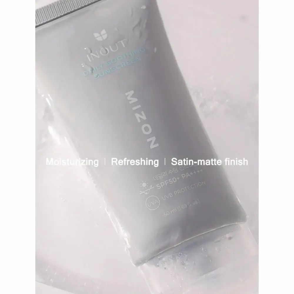 Tubetto grigio con MIZON e INOUT. Testo: Moisturizing, Refreshing, Satin-matte finish, SPF50+ PA++++.