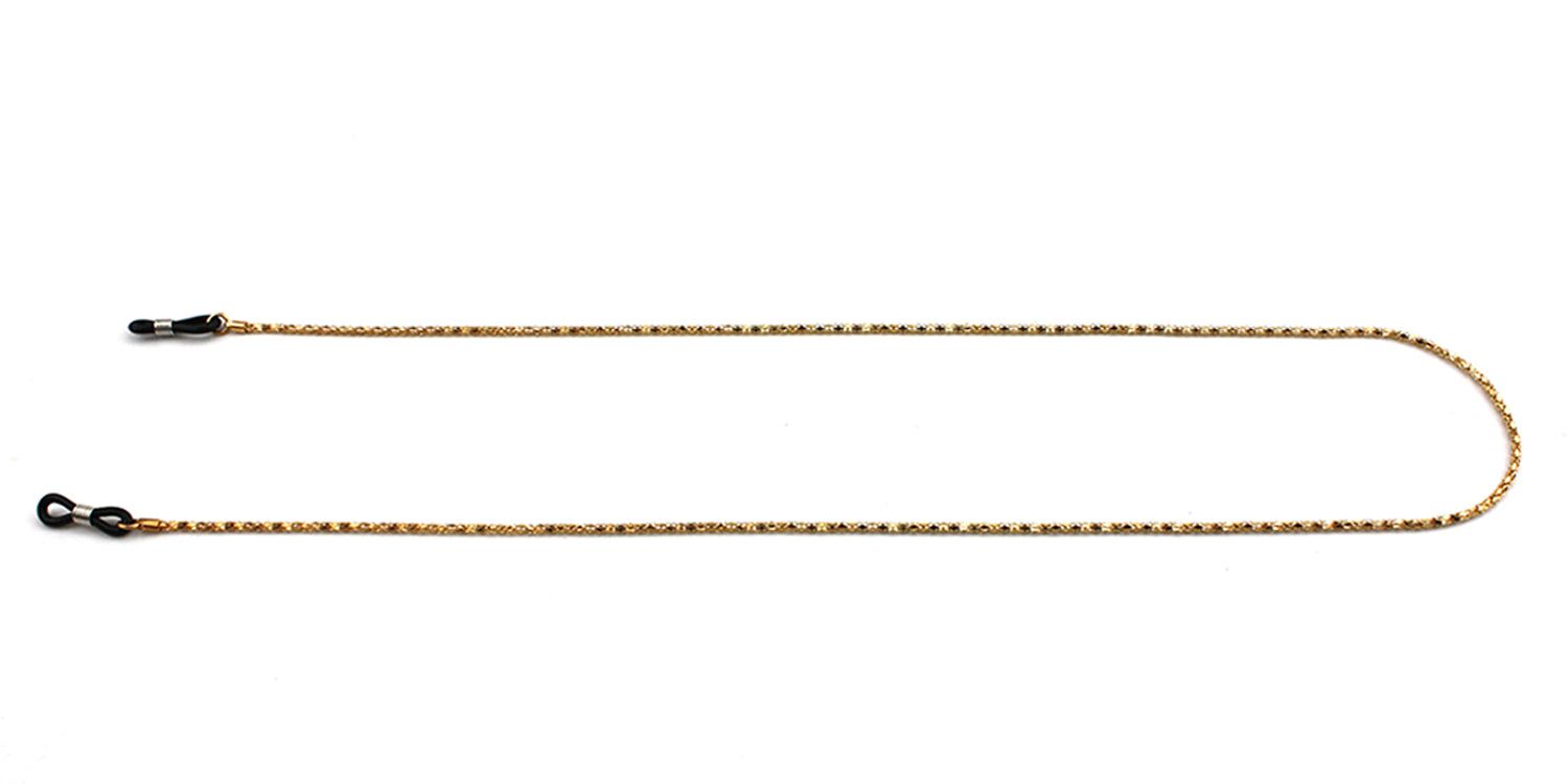 Catena per occhiali dorata con anelli in gomma neri. La catena è disposta orizzontalmente.