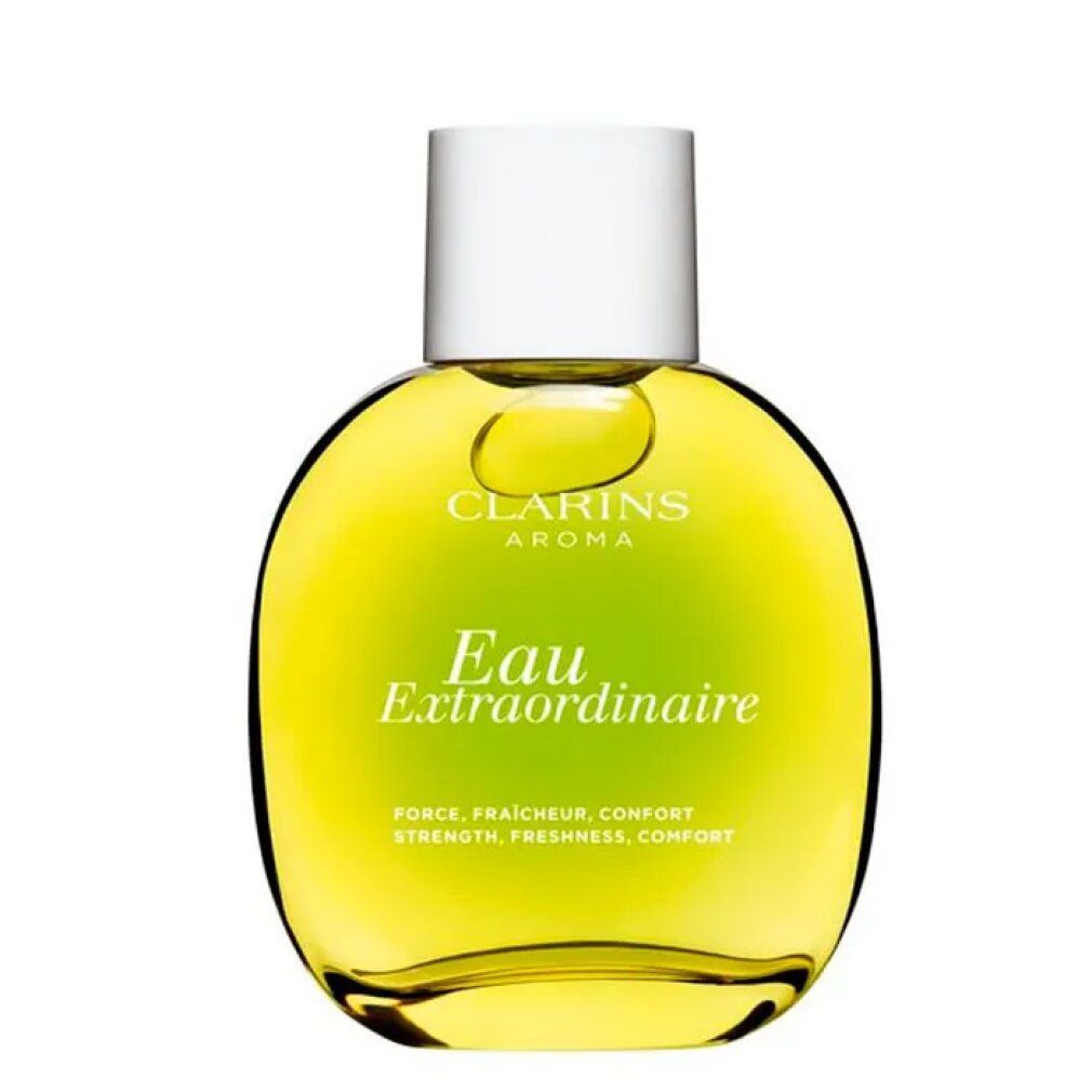 Flacone rotondo con liquido giallo. Scritta: Clarins Aroma Eau Extraordinaire. Tappo bianco.