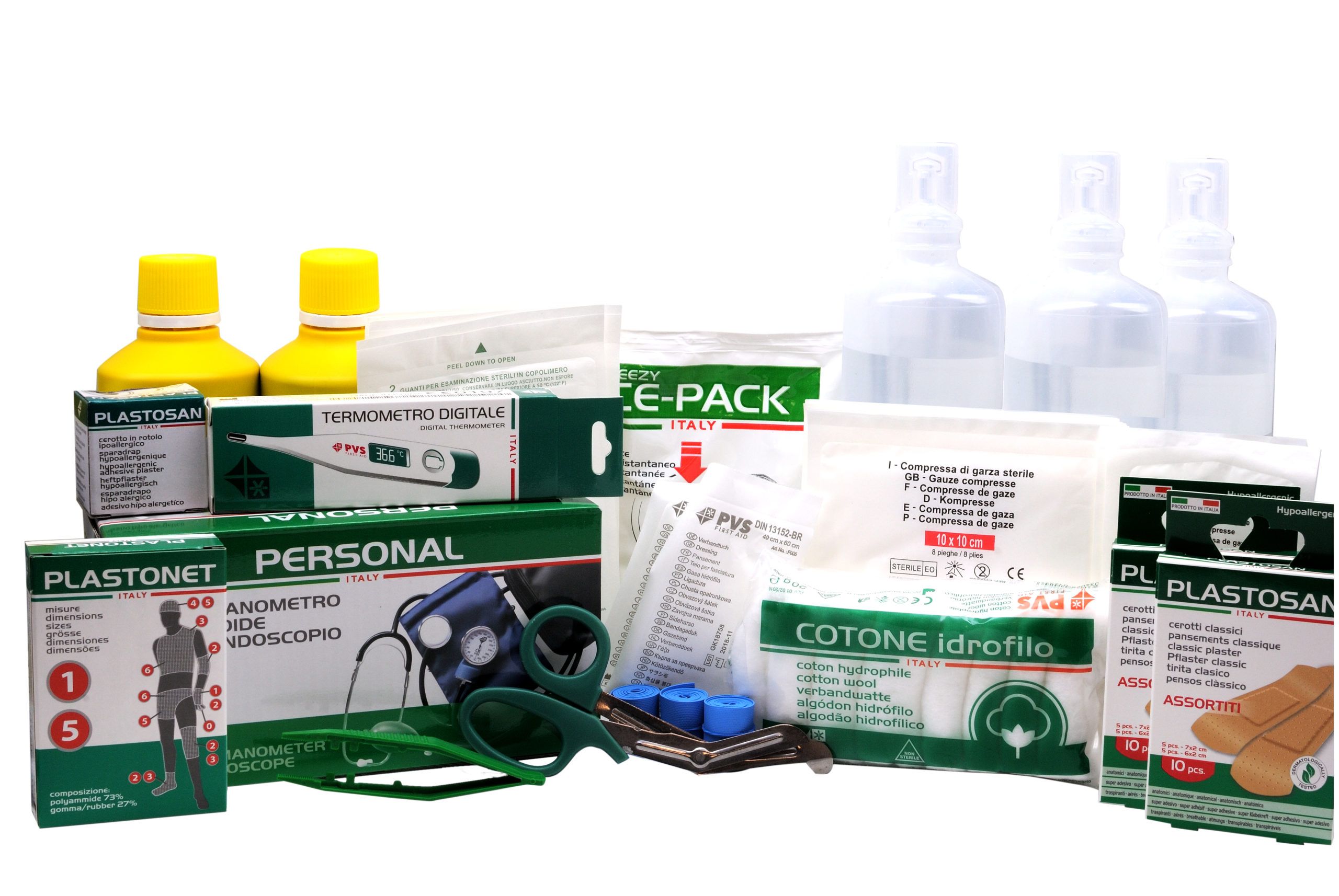 Kit di pronto soccorso con vari componenti: flaconi, bende, termometro, sfigmomanometro, forbici.
