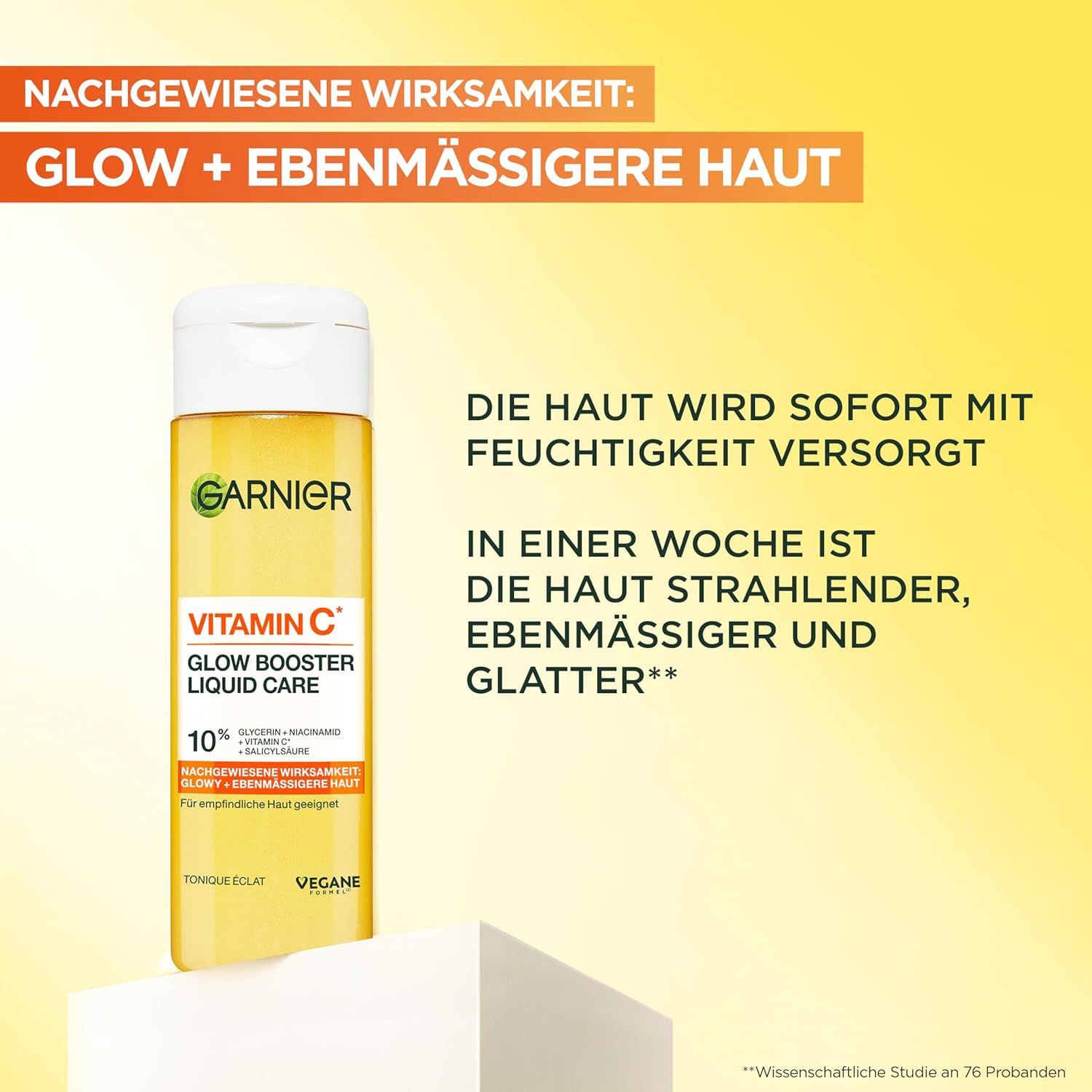 Garnier Vitamin C Glow Booster Liquid Care. Flacone giallo con tappo bianco. Testo: Glow + pelle più uniforme.