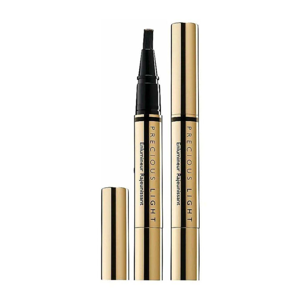 Guerlain Precious Light Highlighter. Penna dorata con punta nera e cappuccio. Testo sulla penna.