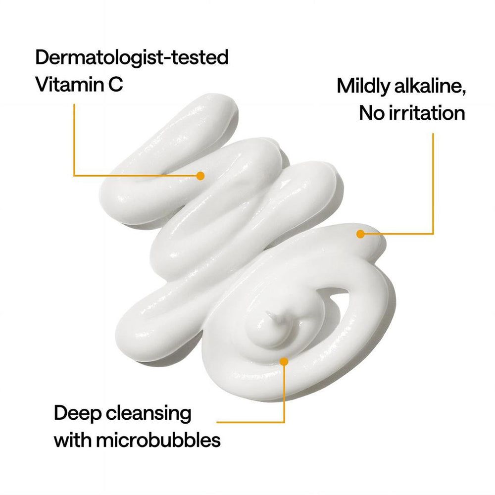 Prodotto bianco con testo. Scritta: Testato dermatologicamente, Vitamina C, Pulizia profonda, Nessuna irritazione. Campi di testo gialli.