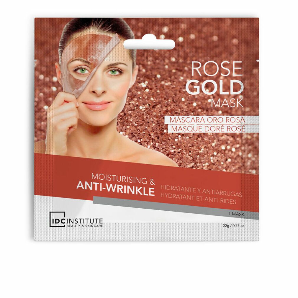 Maschera viso Rose Gold, anti-rughe. Donna con maschera su metà viso. Confezione con nome prodotto e marchio.