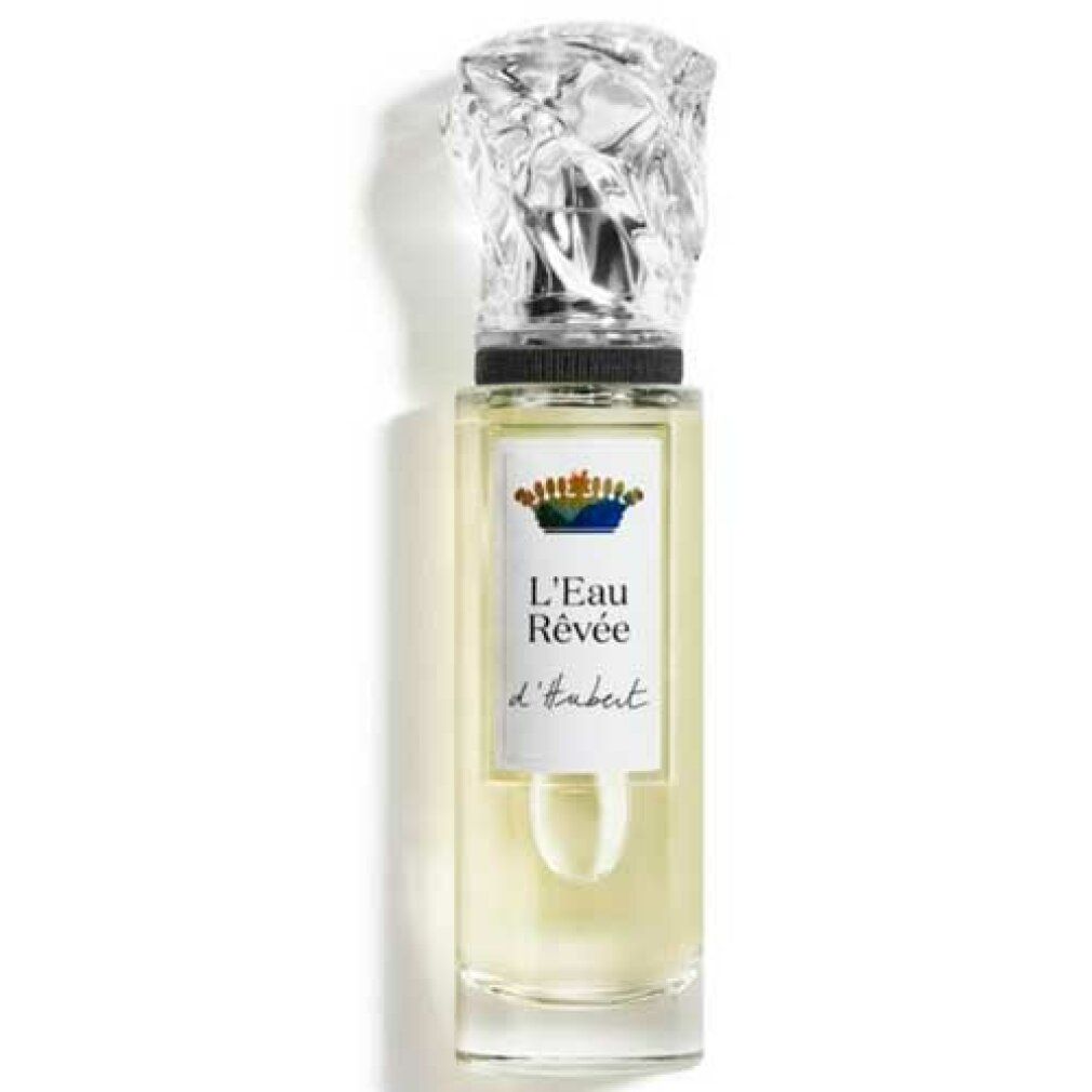 Flacone in vetro con contenuto trasparente. Scritta: L'Eau Rêvée d'Hubert. Tappo: a forma di cristallo.