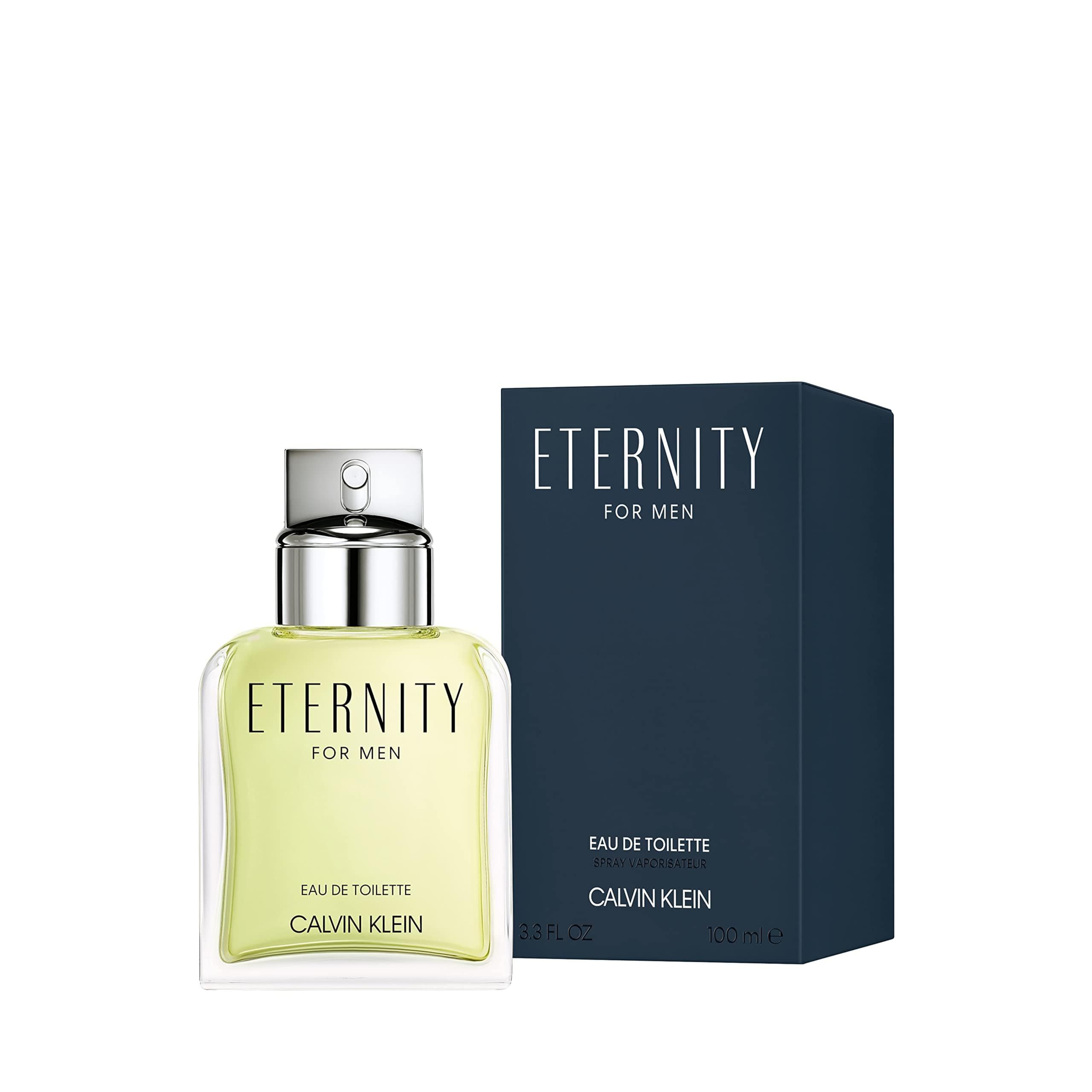 Un flacone di vetro rettangolare con tappo argentato e una scatola blu. Etichetta con "ETERNITY FOR MEN", "EAU DE TOILETTE" e "CALVIN KLEIN".