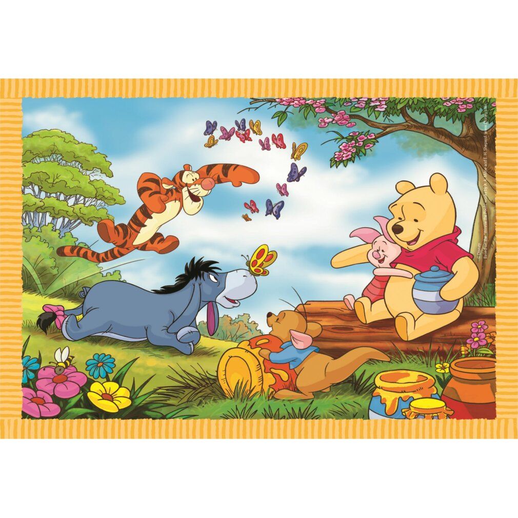 Pezzo di puzzle con Winnie the Pooh e amici. Cornice gialla. Scene con Tigro, Eeyore, Pimpi e Kanga. Farfalle colorate.