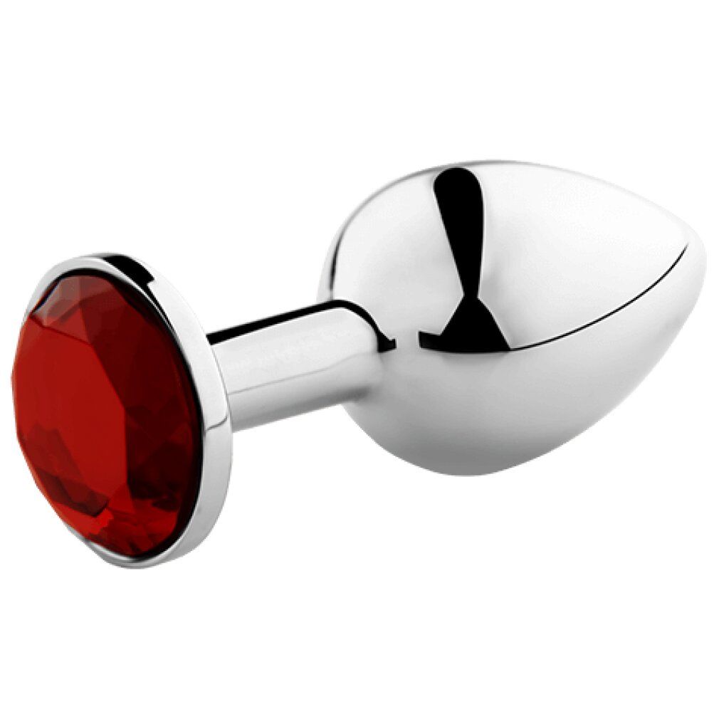 Plug anale in metallo lucido con pietra rossa. Forma conica con punta arrotondata e base rotonda con pietra.