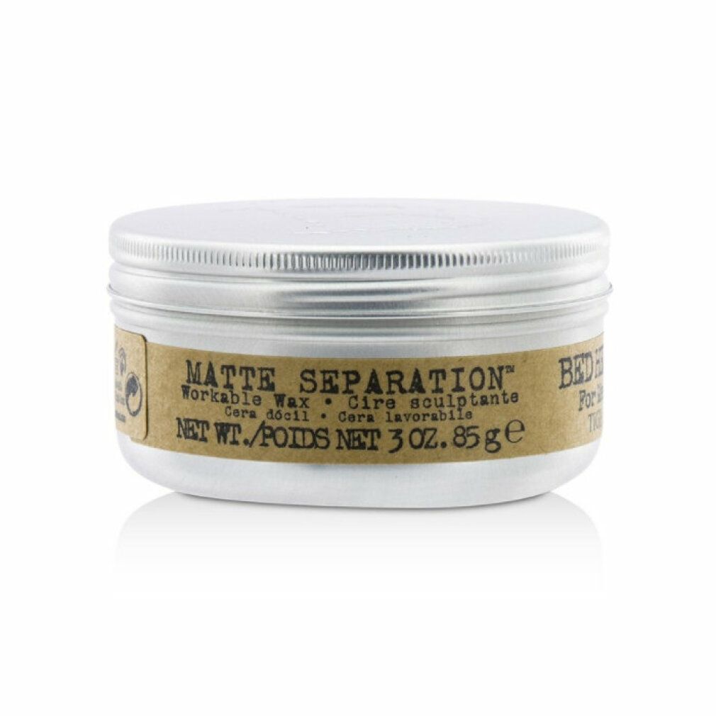 Barattolo rotondo con coperchio argentato. Etichetta con "Matte Separation Workable Wax" e "Bed Head For Men Tigi".
