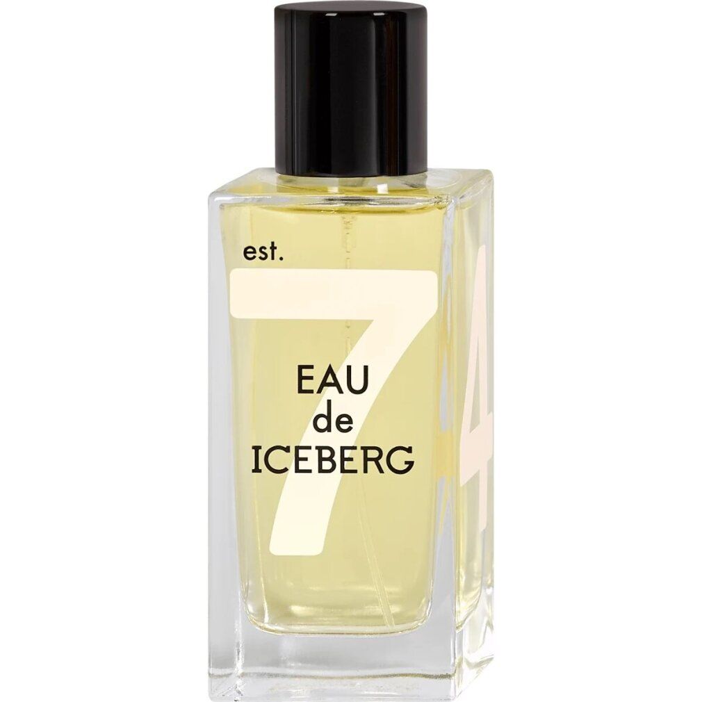 Flacone di profumo. Scritta: Eau de Iceberg 74. Flacone rettangolare con tappo nero. Liquido chiaro.