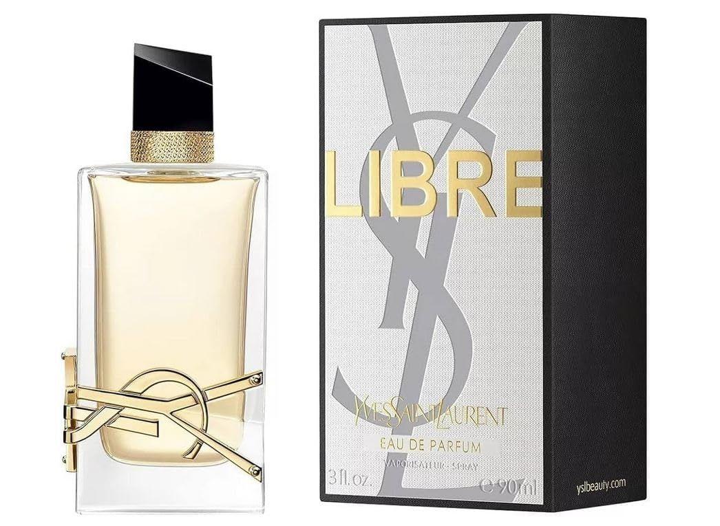 Flacone di profumo e confezione. Flacone con logo dorato, confezione con logo e scritta 'LIBRE'.