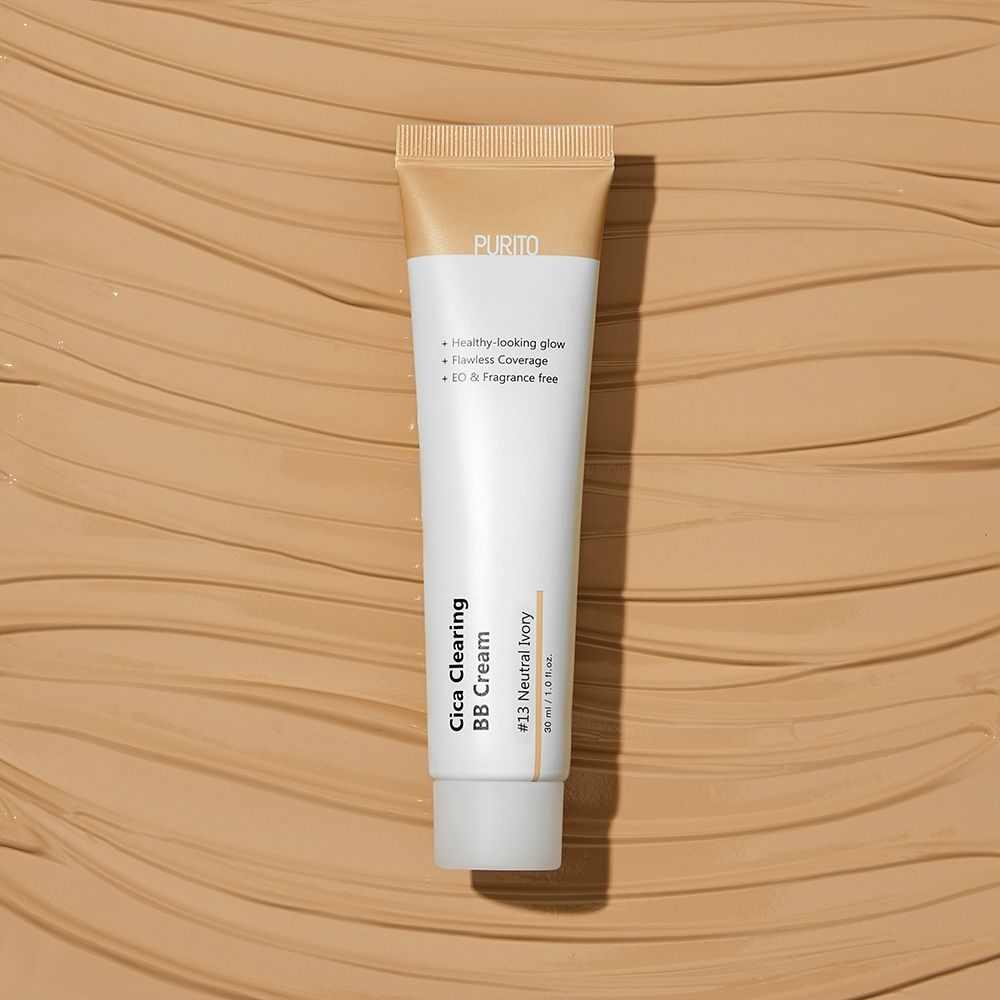 Tubo di crema con testo su sfondo beige. Contiene BB Cream. Tonalità #13 Neutral Ivory.