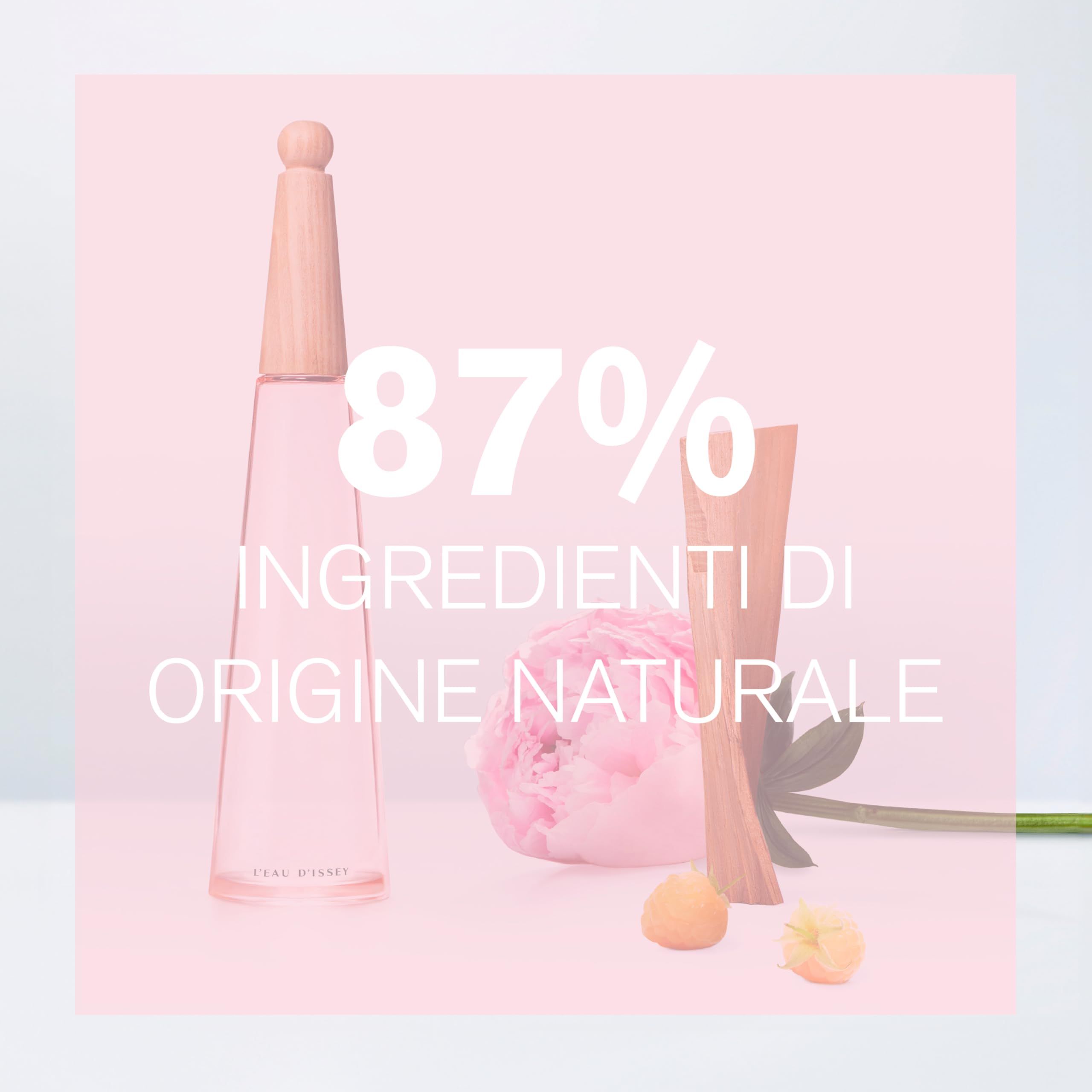 Flacone rosa con tappo in legno, peonia, pezzo di legno e sfere. Testo: 87% Ingrédienti di origine naturale.
