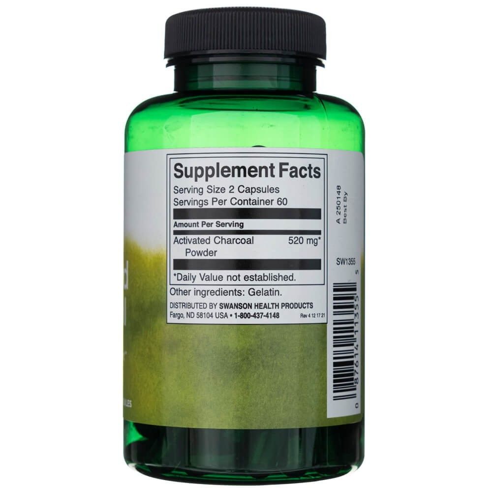 Retro di un flacone verde di carbone attivo Swanson con informazioni nutrizionali e ingredienti.