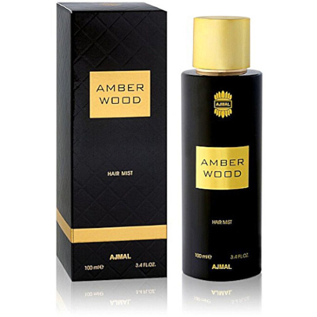 Flacone e scatola neri. Etichetta dorata "AMBER WOOD" e "HAIR MIST". Marchio "AJMAL".