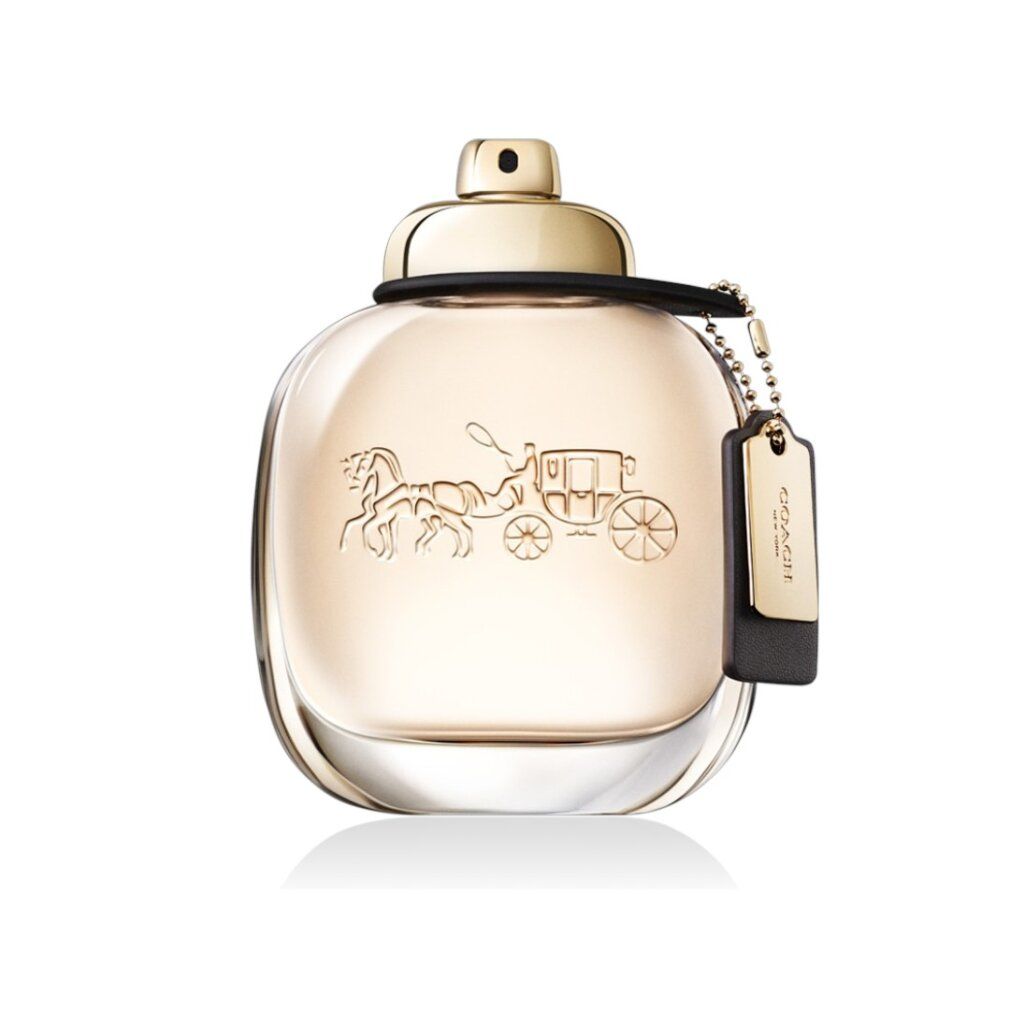 Flacone rotondo con tappo dorato. Ciondolo in pelle nera con logo dorato. Coach New York Eau de Parfum.
