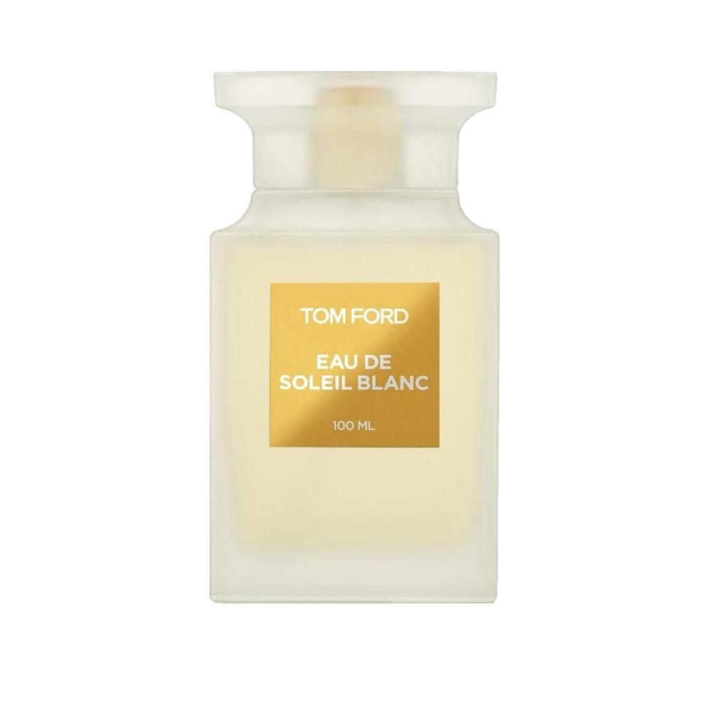 Flacone rettangolare con liquido bianco. Etichetta dorata con scritta TOM FORD EAU DE SOLEIL BLANC. Tappo trasparente.