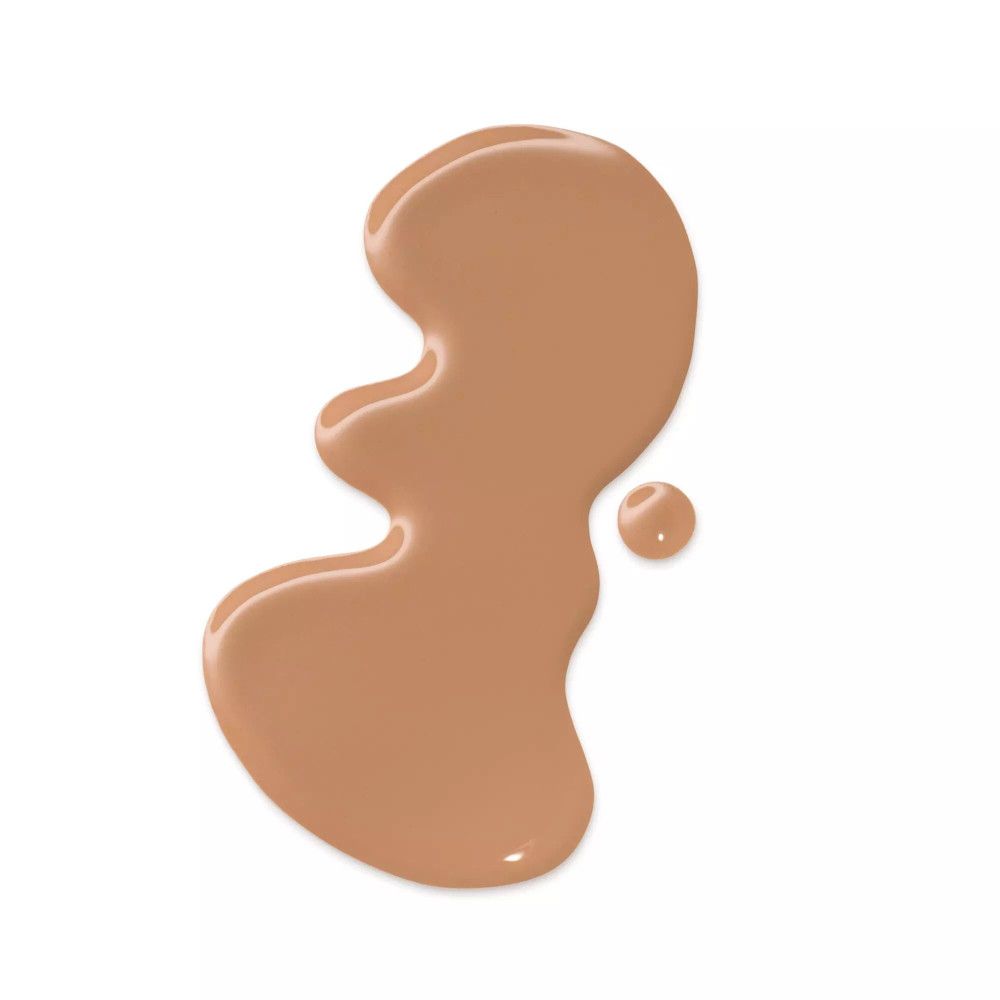 Macchia di fondotinta Skin Tint. Tonalità: marrone chiaro. Su sfondo bianco.