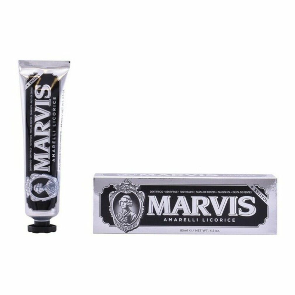 Tubo e scatola di dentifricio. Tubo argentato con stampa nera. Scatola con stampa nera e logo.