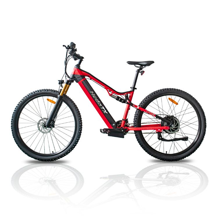Mountain bike elettrica rossa con pneumatici neri. Scritta HedaTX TX19 sul telaio. Riflettori gialli sulle ruote. Sella e manubrio neri.