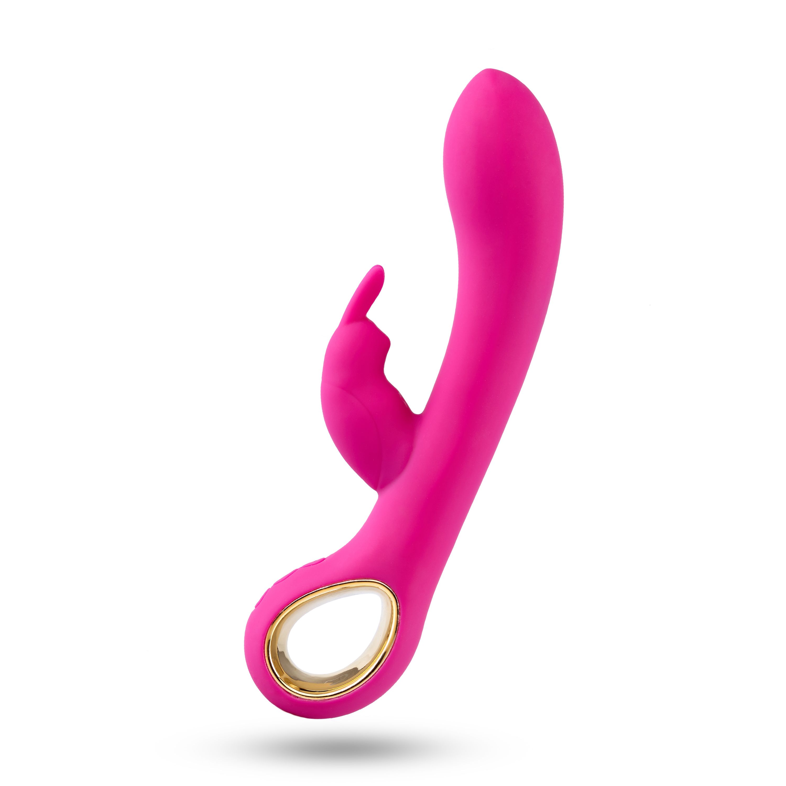Vibratore rosa con design a orecchie di coniglio. Dettagli dorati. Su sfondo bianco.